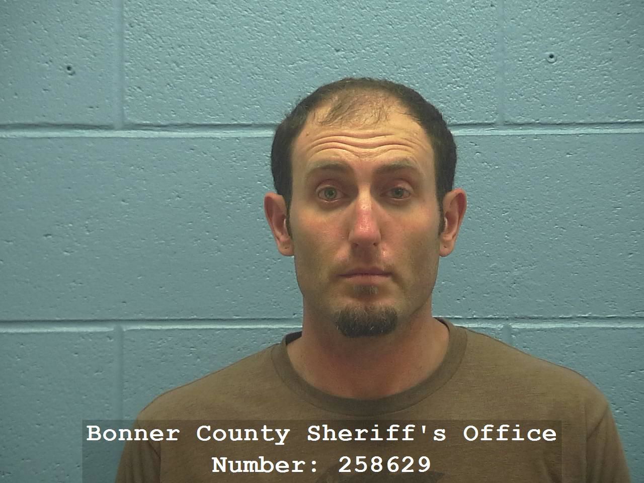 Man arrested with more than 10 lbs of drugs, stolen firearm after mulit-county chase